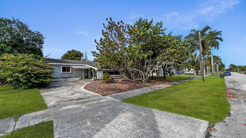 Photo of 224 Greenbriar Drive, Lake Park, FL 33403 (MLS # R10801411)