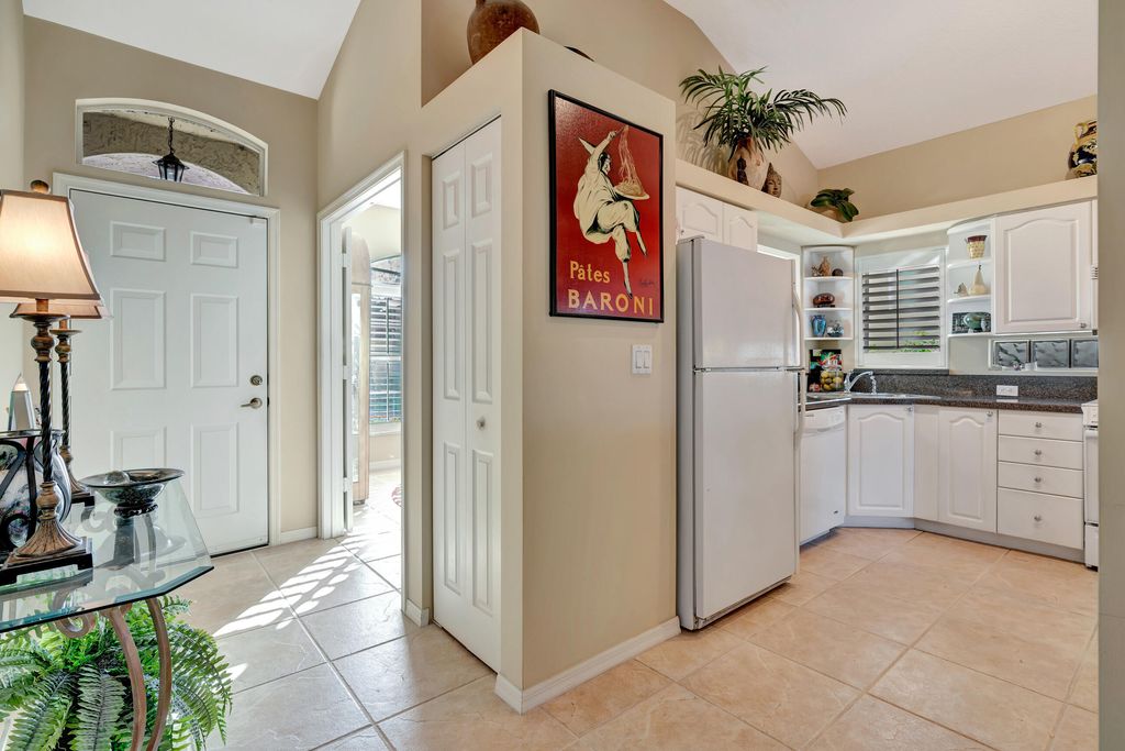 Photo of 5018 Elpine Way, Riviera Beach, FL 33418 (MLS # R10945312)