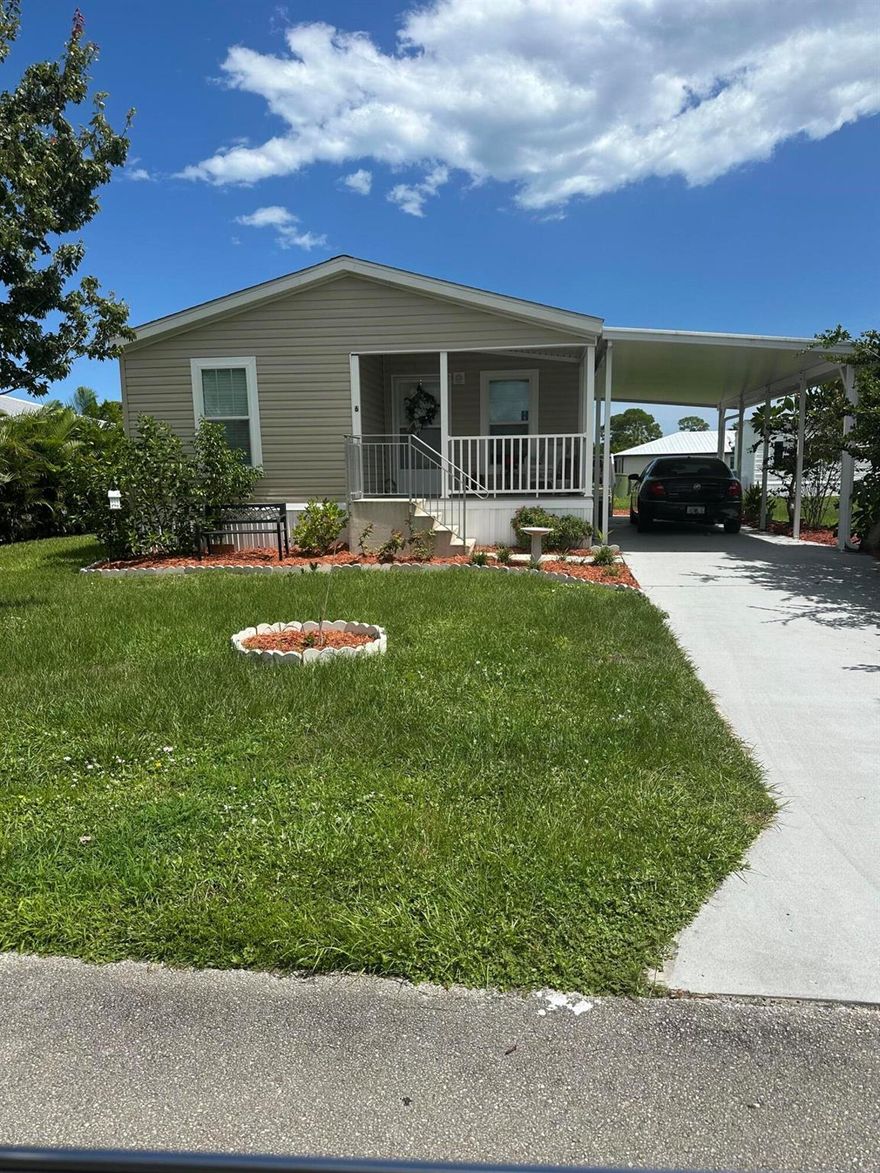 Absolutely beautiful like new 2021 manufactured home in Spanish Lakes.  Home boasts 2 bed 2 bath open floorplan with kitchen that opens to living and dining areas as well as inside laundry.  Rocking chair front porch.  Free golf, lawn care, pool, pickleball, tennis and so much more included.  Don't miss this one.  Buyer to verify all info.