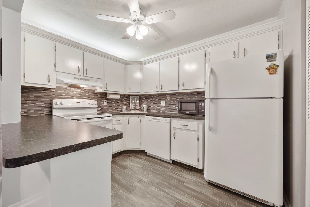 Photo of 5861 La Paseos Drive #D-2, Greenacres, FL 33463 (MLS # R11154368)