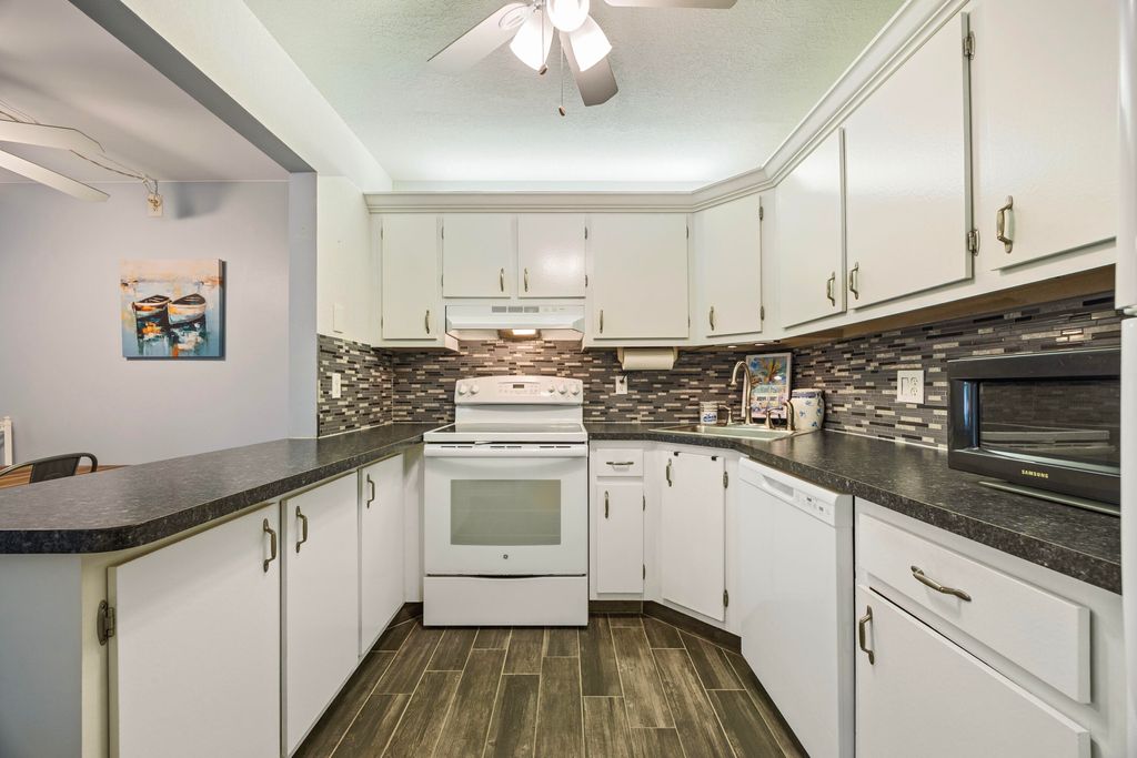 Photo of 5861 La Paseos Drive #D-2, Greenacres, FL 33463 (MLS # R11154368)