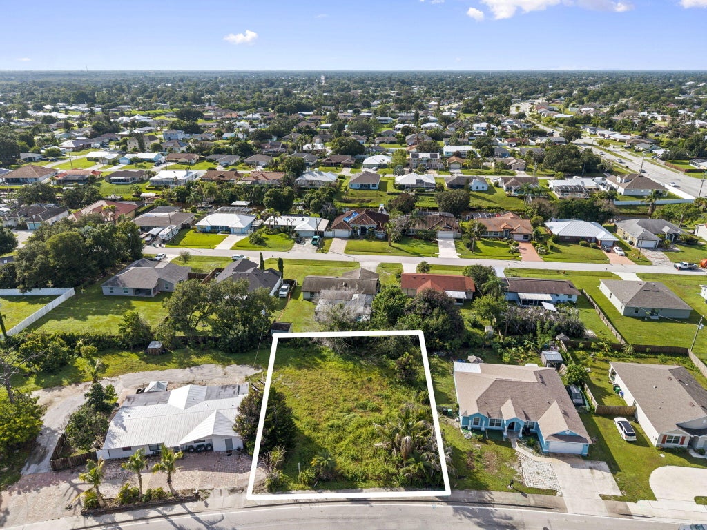 Photo of 158 NE SAINT JAMES DR, Port Saint Lucie, FL 34983 (MLS # B26070543)