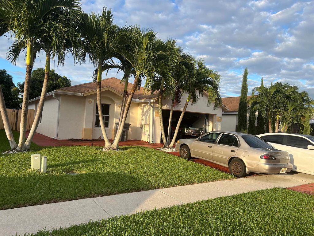 Photo of 5973 Azalea Circle, West Palm Beach, FL 33415 (MLS # R11132954)