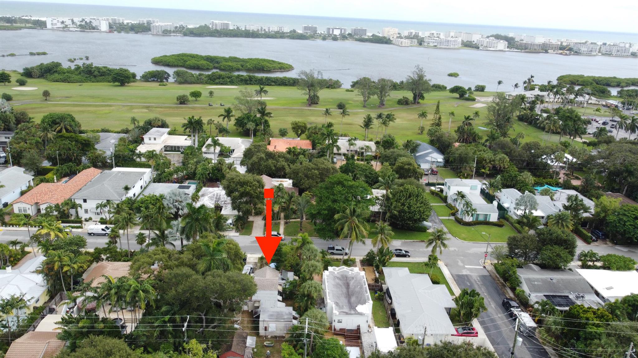 Location, Location, Location! Welcome to Parrot Cove, one of the best neighborhoods in Lake Worth Beach. This home is located just one block to the LWB Golf Club which is right on the intracoastal. The neighborhood is full of mature trees and historic homes that maintain the classic Florida style. 8 blocks to downtown shops and dining and a short trip over the bridge to the beach and pier, this could be your great vacation spot or perfect for year round living. The home has a 2022 roof and newer siding. A seperate garage structure is already built in the back and ready for storage or perhaps an ADU. Tons of potential can be found here for the discerning buyer. Price reflects a much needed interior renovation.