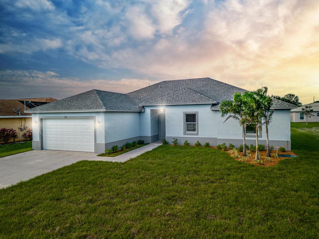 Photo of 5721 NW Wesley Road, Port Saint Lucie, FL 34986 (MLS # R10938310)