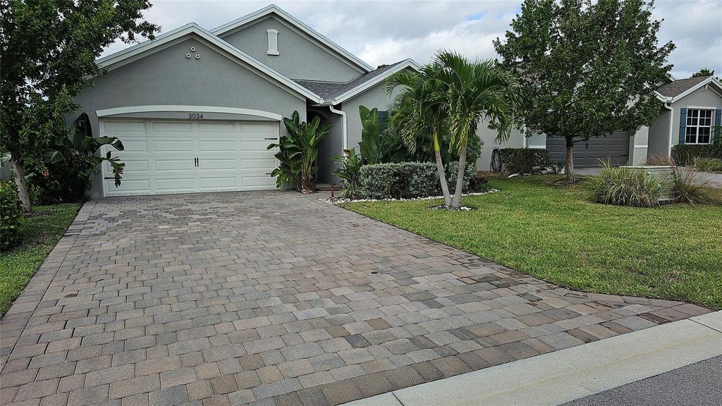 Photo of 3034 NE Skyview Lane, Jensen Beach, FL 34957 (MLS # B26027148)