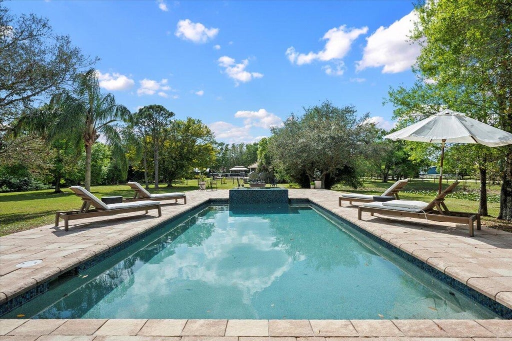 Photo of 9340 159th Court N, Jupiter, FL 33478 (MLS # R11064844)