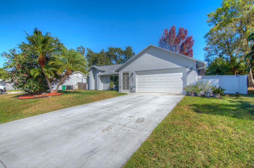 Photo of 3519 SW Margela Street, Port Saint Lucie, FL 34953 (MLS # R11159308)