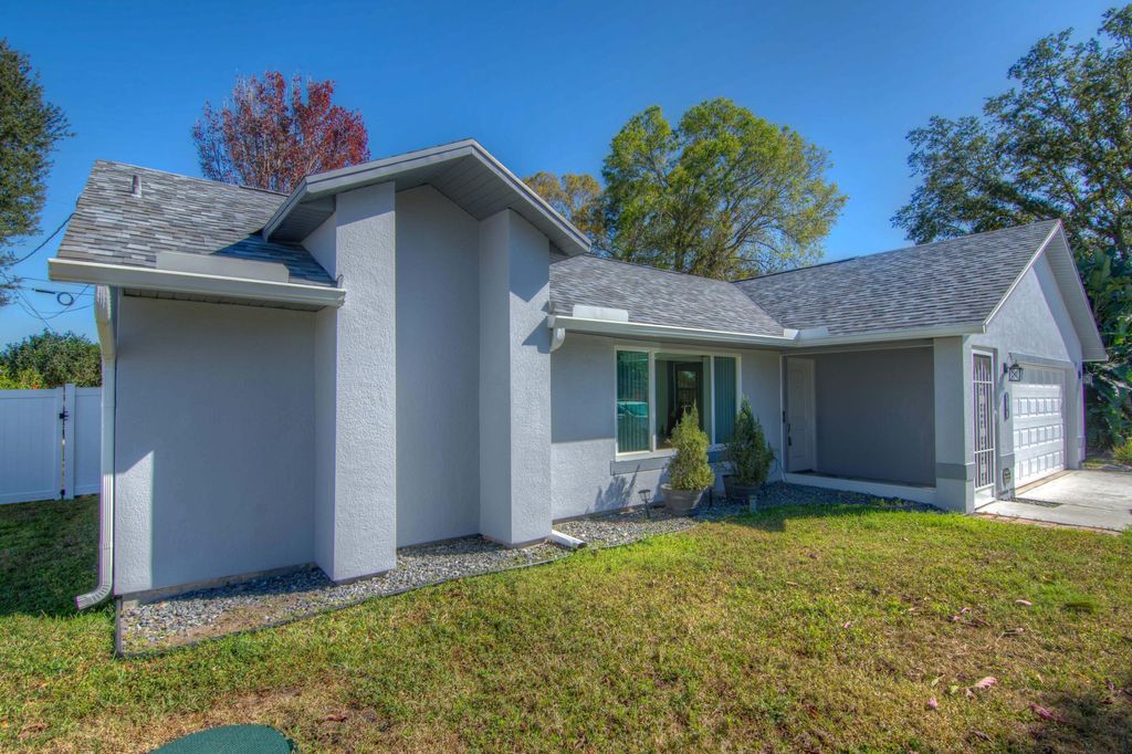 Photo of 3519 SW Margela Street, Port Saint Lucie, FL 34953 (MLS # R11159308)