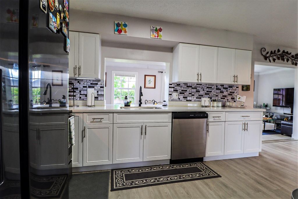 Photo of 855 Azalea Drive, Royal Palm Beach, FL 33411 (MLS # R11118503)