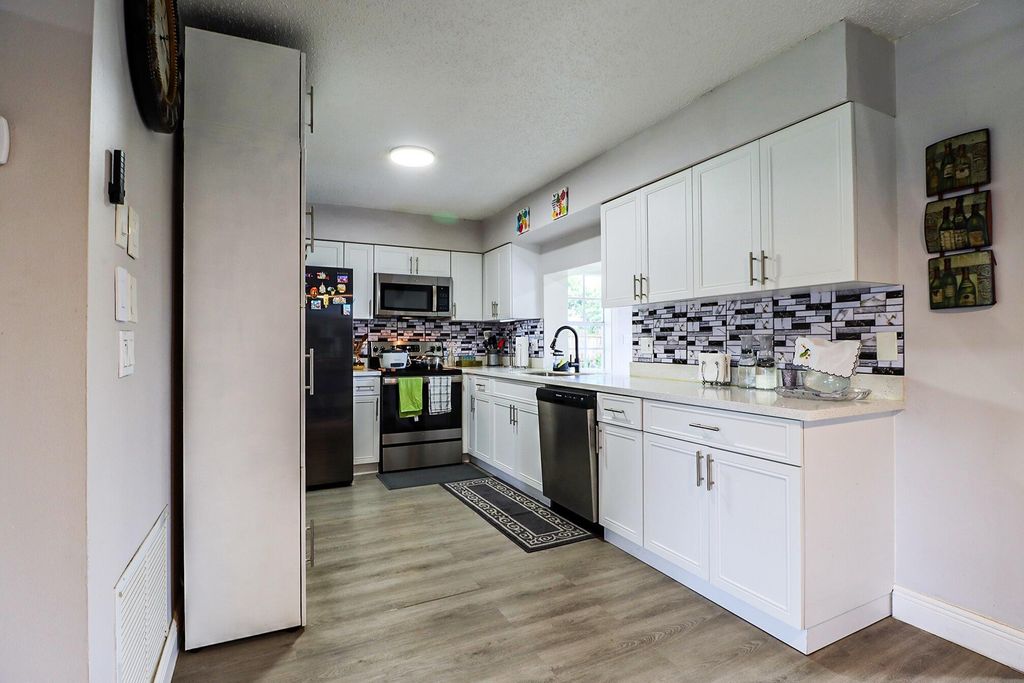 Photo of 855 Azalea Drive, Royal Palm Beach, FL 33411 (MLS # R11118503)