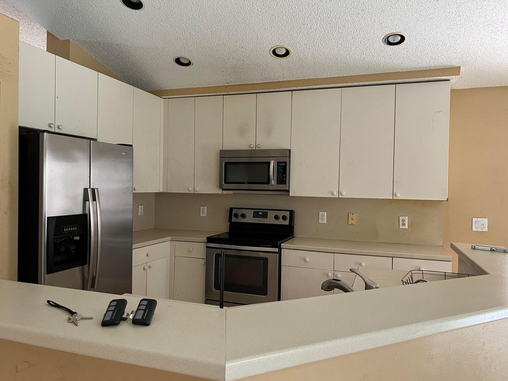 Photo of 1350 NW 143rd Avenue, Pembroke Pines, FL 33028 (MLS # B26017959)