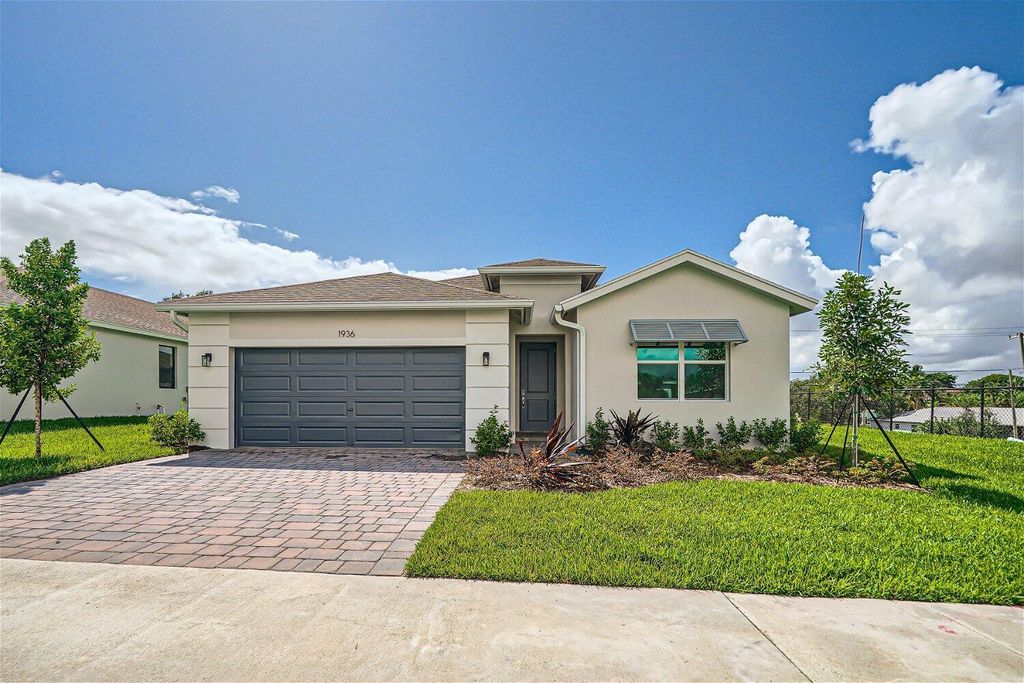 Photo of 1936 NE Ocean Dunes Drive, Jensen Beach, FL 34957 (MLS # R10907264)