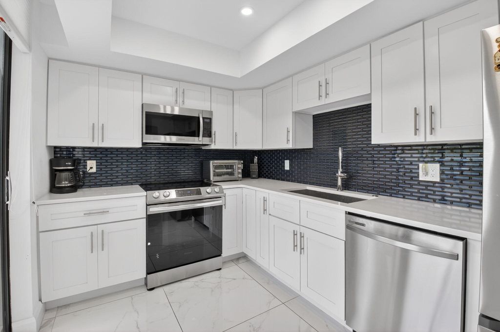 Photo of 6815 Willow Wood Drive #4012, Boca Raton, FL 33434 (MLS # B26016530)