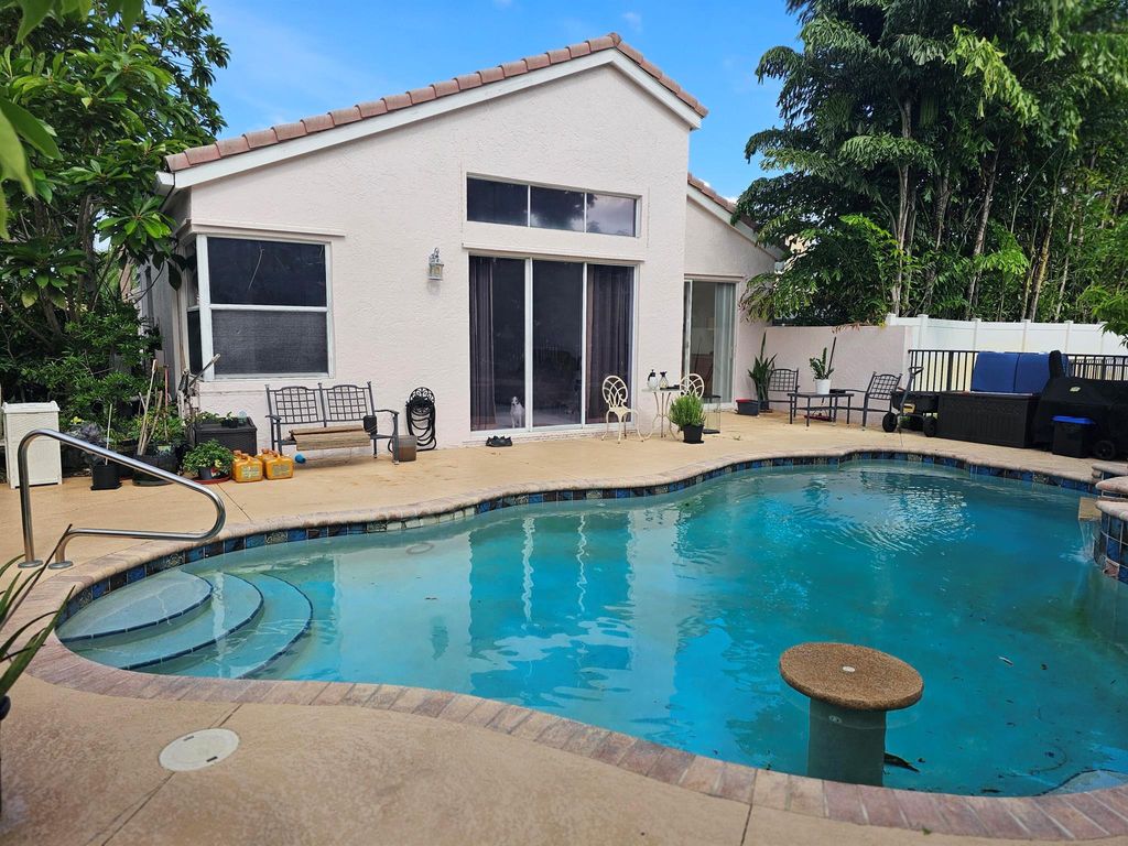 Photo of 6933 Dawntree Court, Lake Worth, FL 33467 (MLS # R11103737)