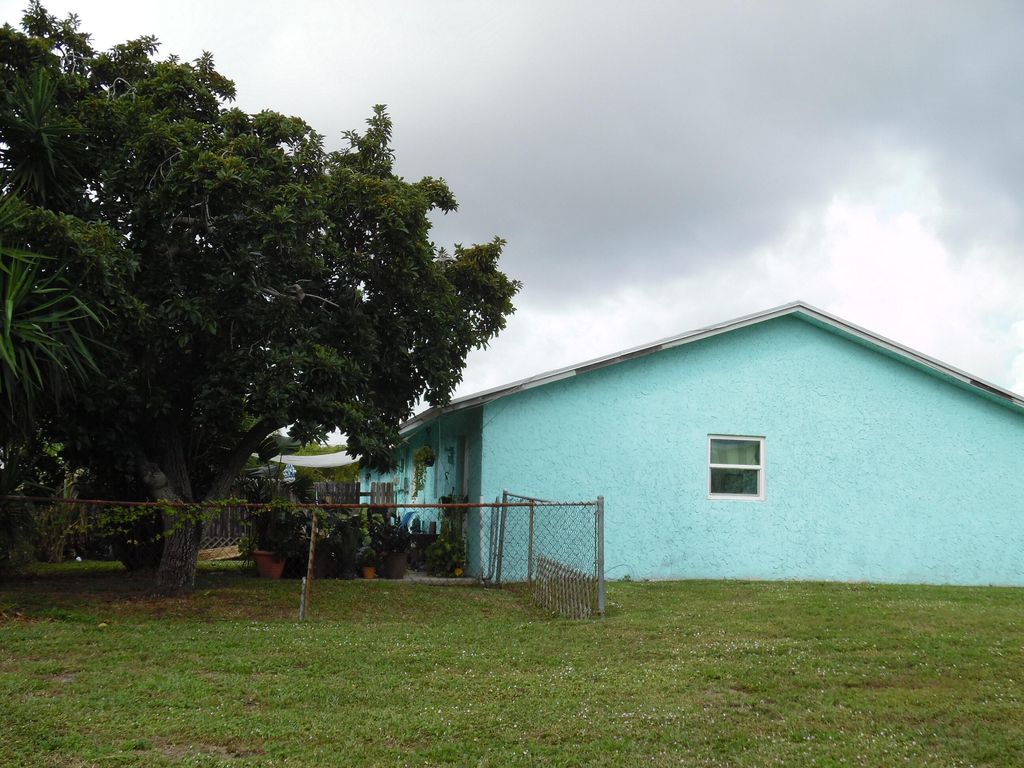 Photo of 3910 Holden Lane, Lake Worth, FL 33461 (MLS # R11148822)