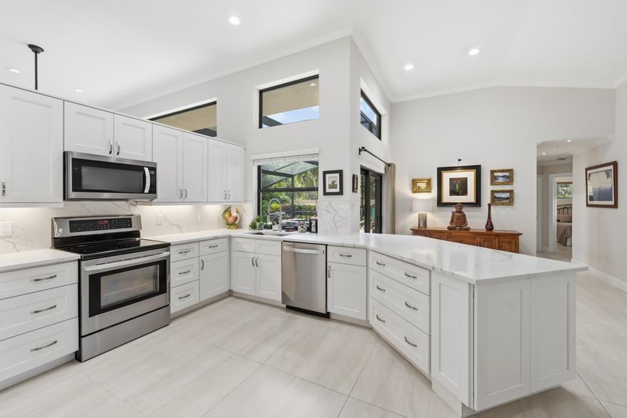 Stunning 4BR/2.5BA home fully remodeled with a sleek modern aesthetic and a rare private backdrop overlooking a 40 acre preserve. This fully updated residence features a brand new five year new heated pool with travertine pavers, a relaxing hot tub, and a spacious screened outdoor area ideal for year round entertaining. Inside, you'll find a split bedroom floor plan, all impact windows and doors, and an impact-rated garage door for peace of mind. Major upgrades include a 2022 A/C, 2011 roof, and new kitchen and bathrooms finished with quartz countertops and stylish contemporary finishes. The home offers consistent flooring throughout, creating a seamless, modern flow in every room. With its pristine condition, premium upgrades, and unmatched preserve views, this home is truly a must see. Secure man-gated Community.