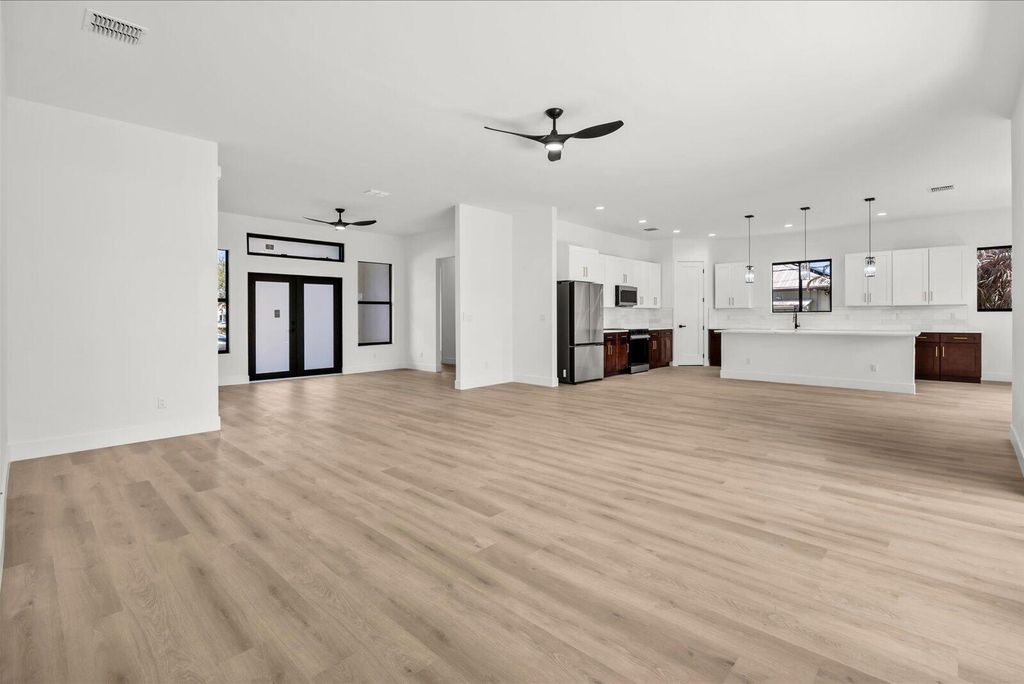 Photo of 5691 NW North Macedo Blvd, Port Saint Lucie, FL 34983 (MLS # B26001122)