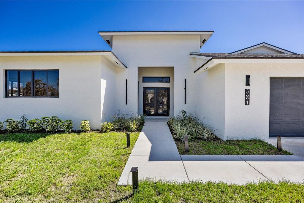 Photo of 5691 NW North Macedo Blvd, Port Saint Lucie, FL 34983 (MLS # B26001122)