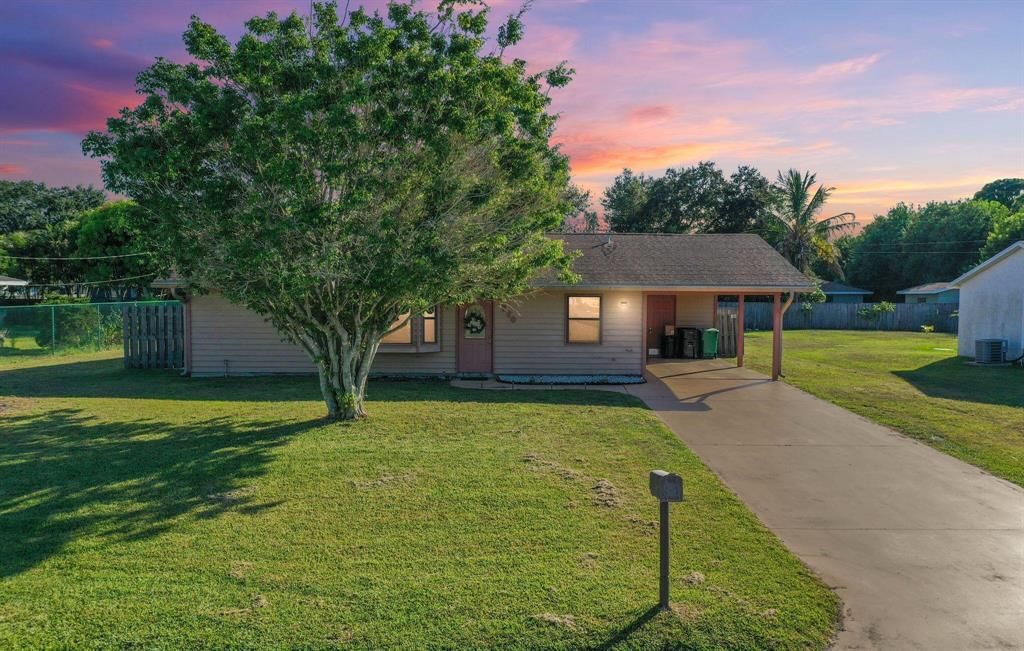 Photo of 2220 SE Gaslight Street St, Port St Lucie, FL 34952 (MLS # R10830165)