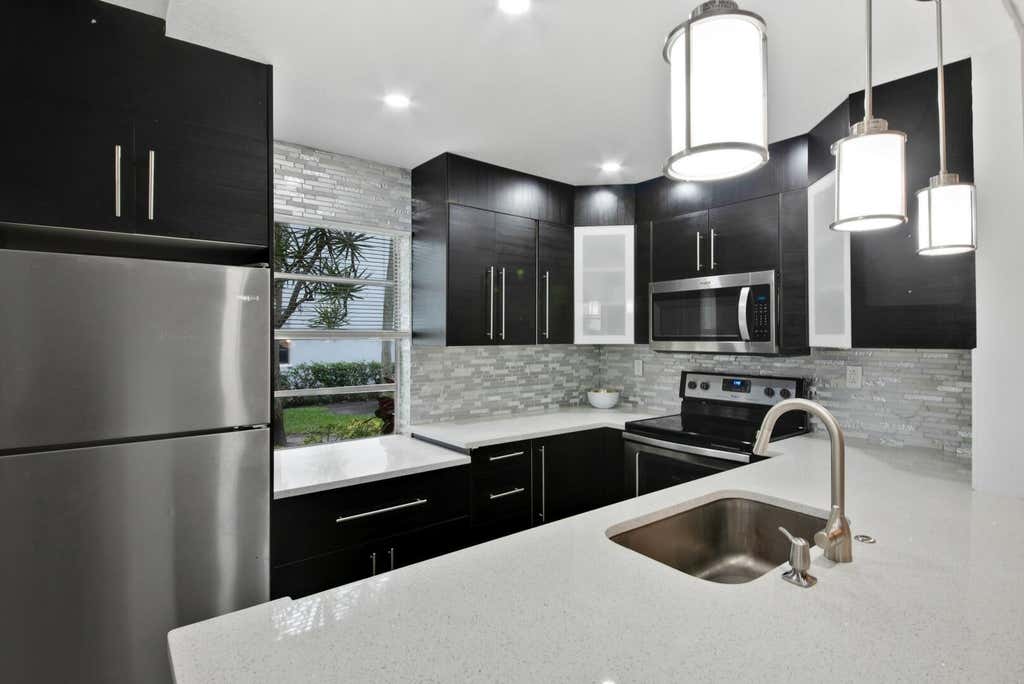 Photo of 21 NORMANDY A #21, Delray Beach, FL 33484 (MLS # B26063511)