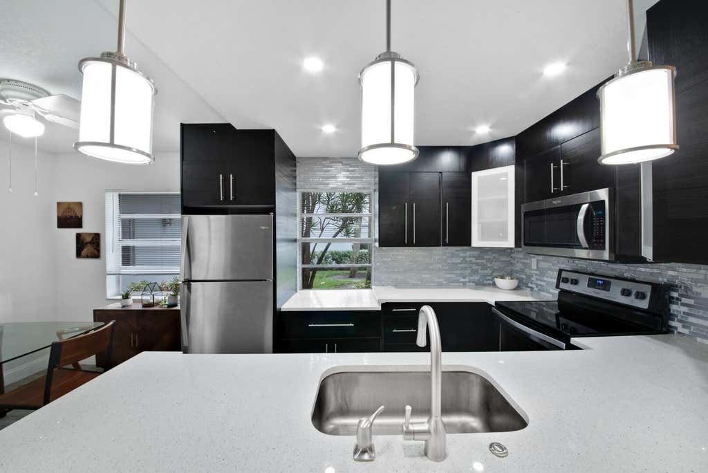 Photo of 21 NORMANDY A #21, Delray Beach, FL 33484 (MLS # B26063511)