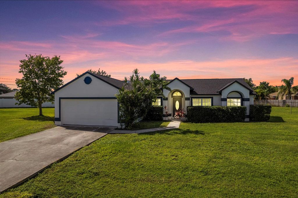 Photo of 4570 SW Log Court, Port Saint Lucie, FL 34953 (MLS # R10946292)