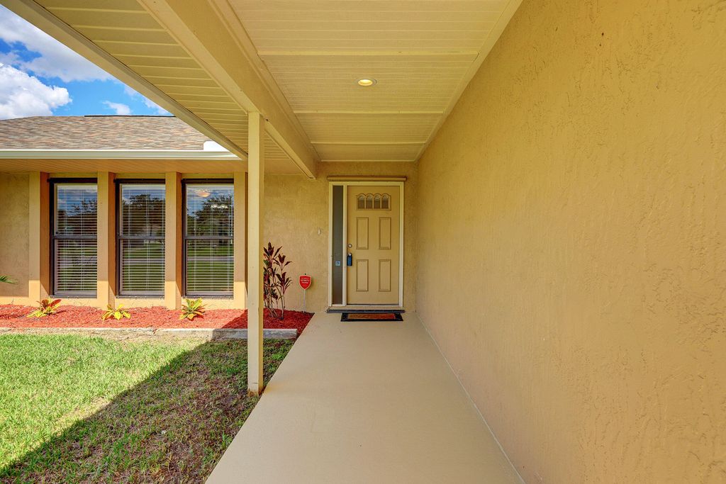 Photo of 1887 SW Import Drive, Port St Lucie, FL 34953 (MLS # R10829362)