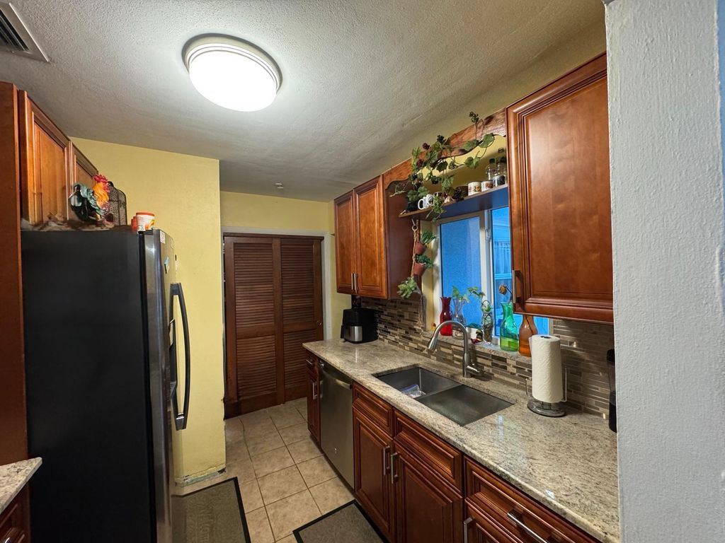 Photo of 31 NE 57th Ct, Fort Lauderdale, FL 33334 (MLS # F10533485)