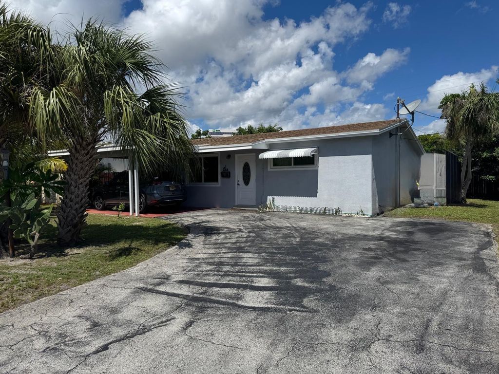 Photo of 31 NE 57th Ct, Fort Lauderdale, FL 33334 (MLS # F10533485)