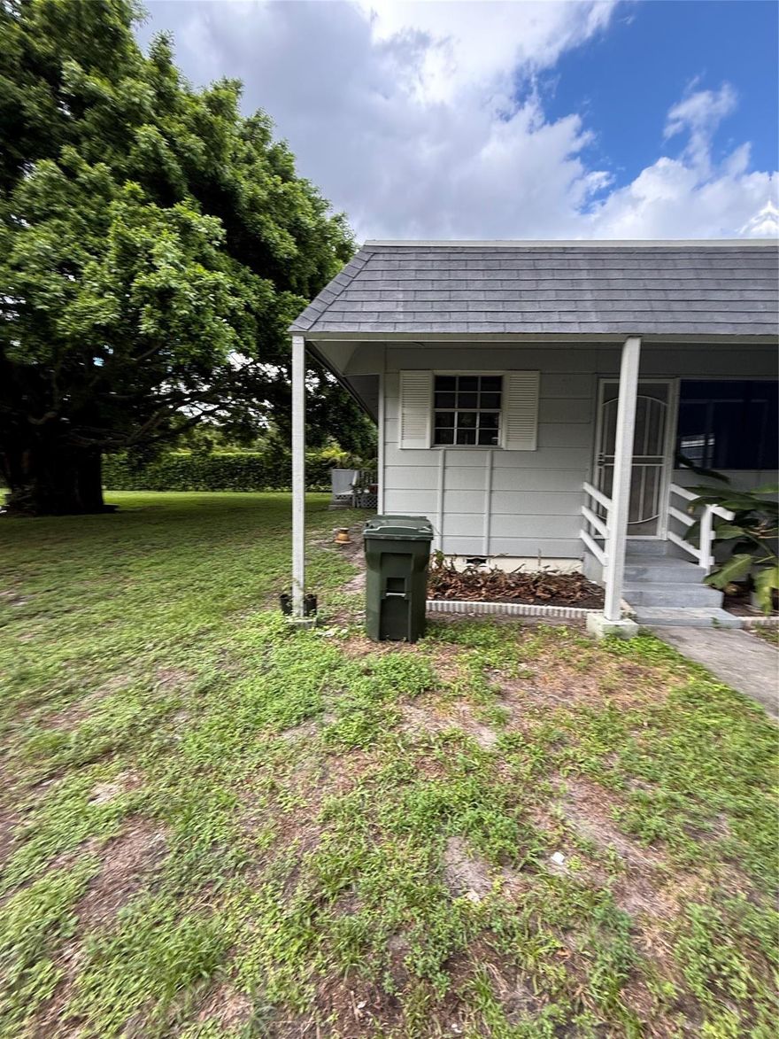 Location Location Location. Run don't Walk to this rarely available style property. In a great Central Area of Coconut Creek and over 1 Acre of land. Wow you heard that right over 1 Acre of land, Small home on the land completely upgraded skys the limit with idea and potential for this property. Anything from construction of a dream estate or keep as is and Airbnb or perfect to keep work trucks on property etc.  endless possibilities homes with this much land in residential popular locations like this do not lasts. Come and see today, keep a trailer , boats, trucks etc on this property....