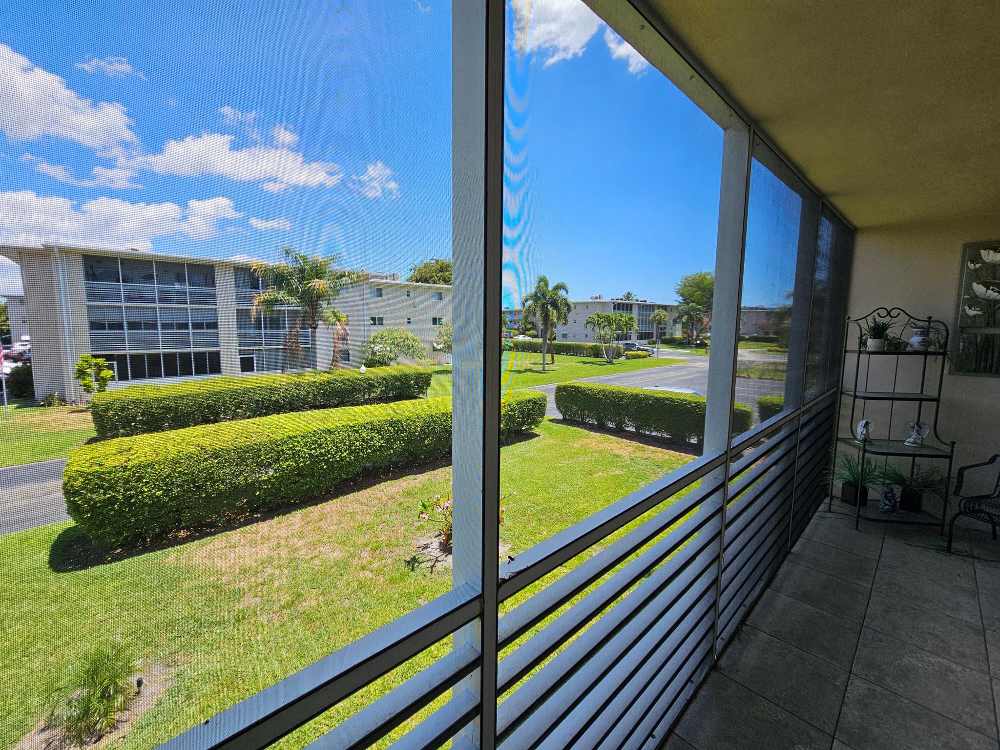 Lovely community centrally located to all Palm Beach County has to offer. Close to beach, shopping, airport and restaurants. This end unit has a large screened porch, stainless steel appliances and tile throughout. This 55+ community has 2 pools, a clubhouse with ongoing activities to maintain an active lifestyle.