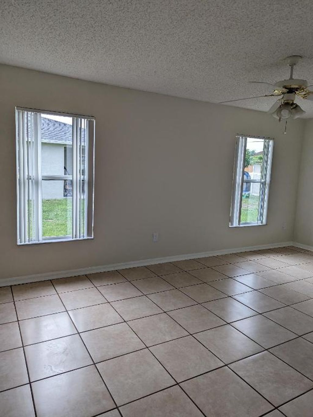 Photo of 3486 SW San Benito Street, Port Saint Lucie, FL 34953 (MLS # R11139360)