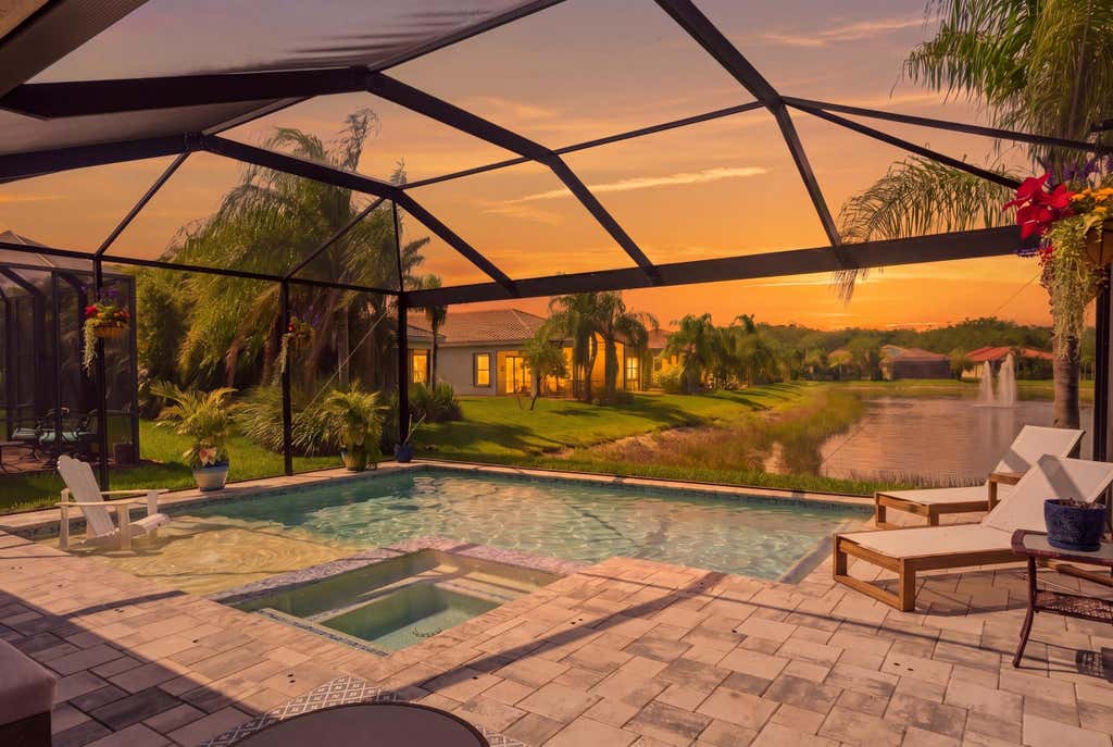 Photo of 11619 Riverstone Lane, Fort Myers, FL 33913 (MLS # B26023436)