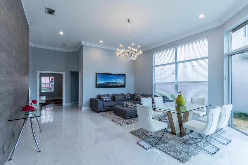 Photo of 6543 NW 43rd Ter, Boca Raton, FL 33496 (MLS # R11084631)