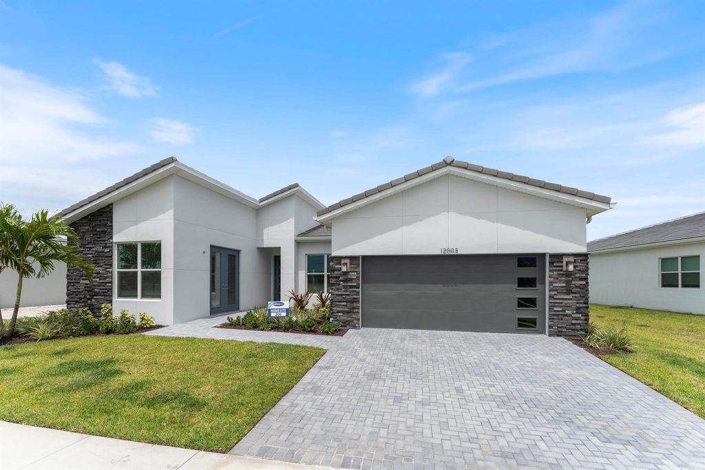 Photo of 12003 SW Toulon Street, Port Saint Lucie, FL 34987 (MLS # R10867676)