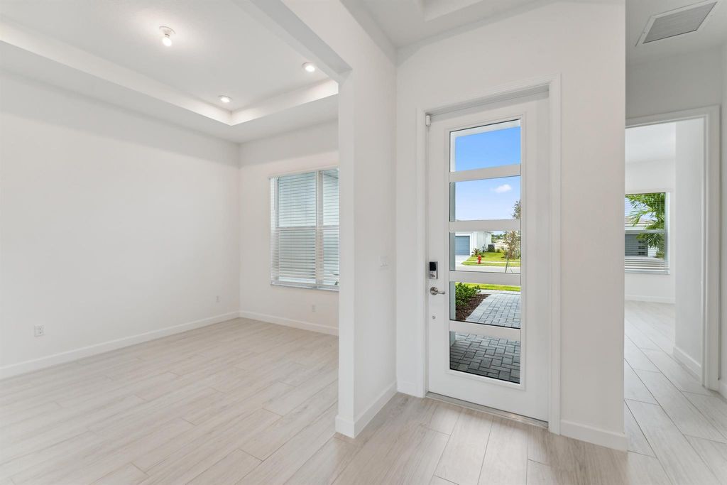 Photo of 12003 SW Toulon Street, Port Saint Lucie, FL 34987 (MLS # R10867676)