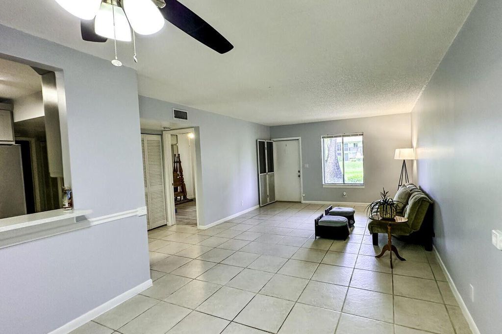 Photo of 6299 Chasewood Dr #D, Jupiter, FL 33458 (MLS # R11089232)