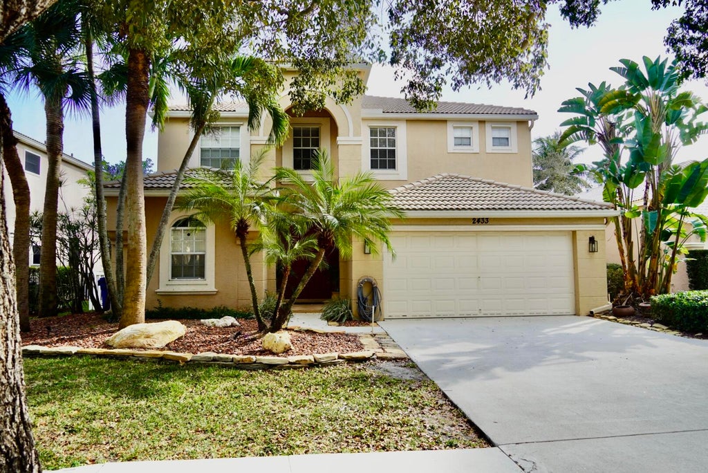 Photo of 2433 Westmont Drive, Royal Palm Beach, FL 33411 (MLS # R10921135)