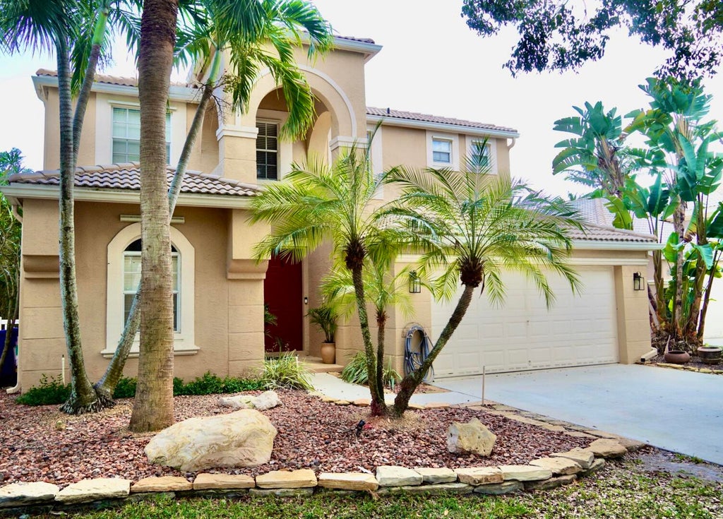 Photo of 2433 Westmont Drive, Royal Palm Beach, FL 33411 (MLS # R10921135)
