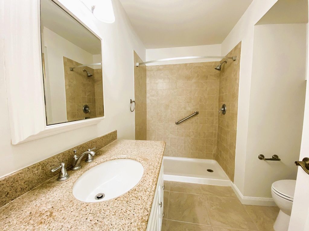 Photo of 815 W Boynton Beach Boulevard #7-102, Boynton Beach, FL 33426 (MLS # R11101547)