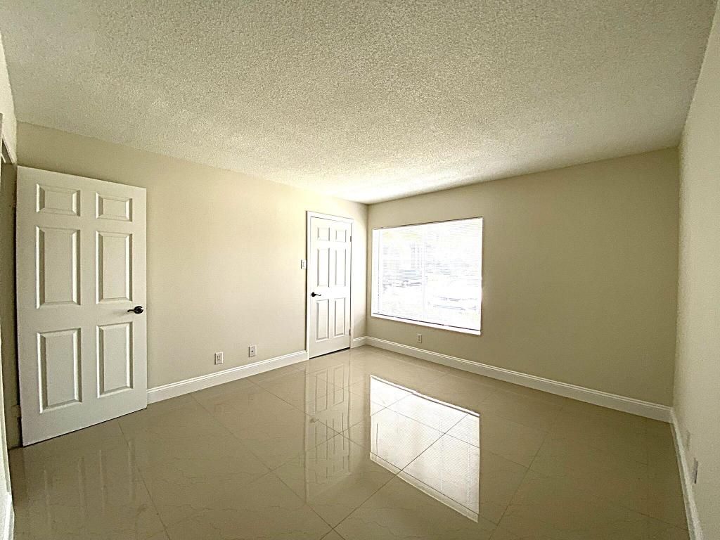 Photo of 815 W Boynton Beach Boulevard #7-102, Boynton Beach, FL 33426 (MLS # R11101547)