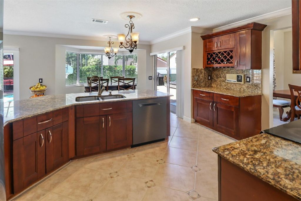 Photo of 5731 NW 62nd Manor, Parkland, FL 33067 (MLS # F10501193)
