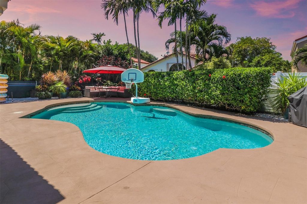 Photo of 5731 NW 62nd Manor, Parkland, FL 33067 (MLS # F10501193)