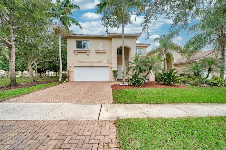 Welcome to the Terracina gated community!  As you enter into this 4 bedroom/2.5 bath spacious and bright home, you'll see beautiful white porcelain tiles throughout first floor. BONUS loft (or office). Over $44k dollars in upgrades, to include impact windows and doors, water filtration system, brand new open kitchen and stainless steel appliances, etc.  Lots of closet space. Corner lot with lots of greenery and an HOA provided playground.  HOA includes all community amenities, clubhouse, swimming pool, exercise room.  Centrally located near shopping plazas and major roadways.  Basic cable and ADT alarm system included.