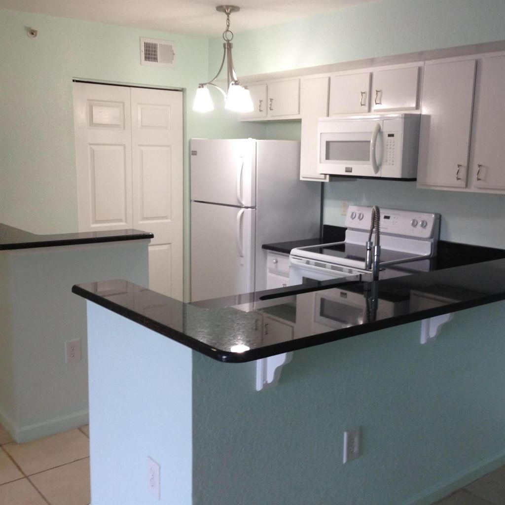 Photo of 171 SW Palm Drive #101, Port Saint Lucie, FL 34986 (MLS # R10998097)