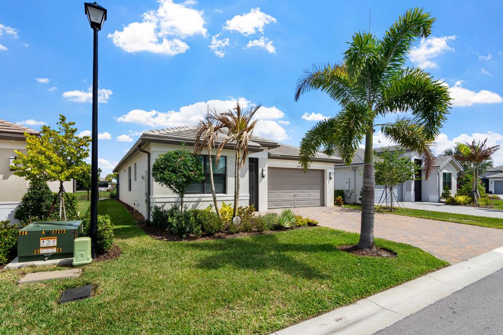Photo of 11919 SW Backshore Drive, Port Saint Lucie, FL 34987 (MLS # B26010580)