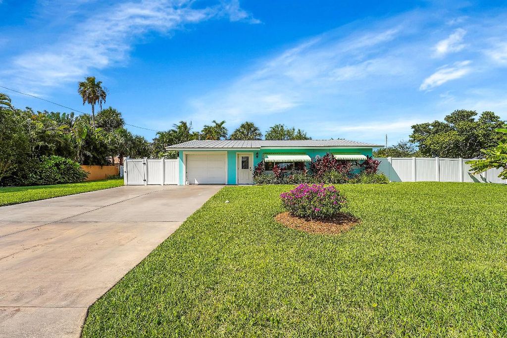 Photo of 1708 Sunset Isles Road, Fort Pierce, FL 34949 (MLS # R11146141)