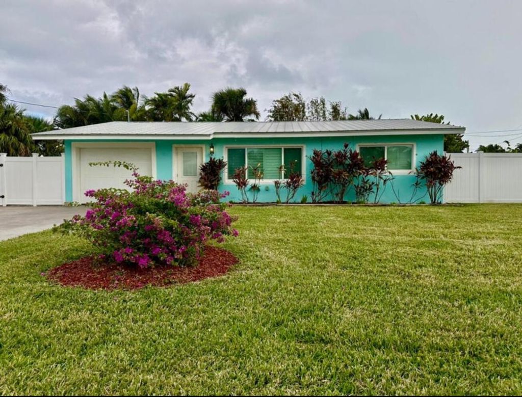 Photo of 1708 Sunset Isles Road, Fort Pierce, FL 34949 (MLS # R11146141)