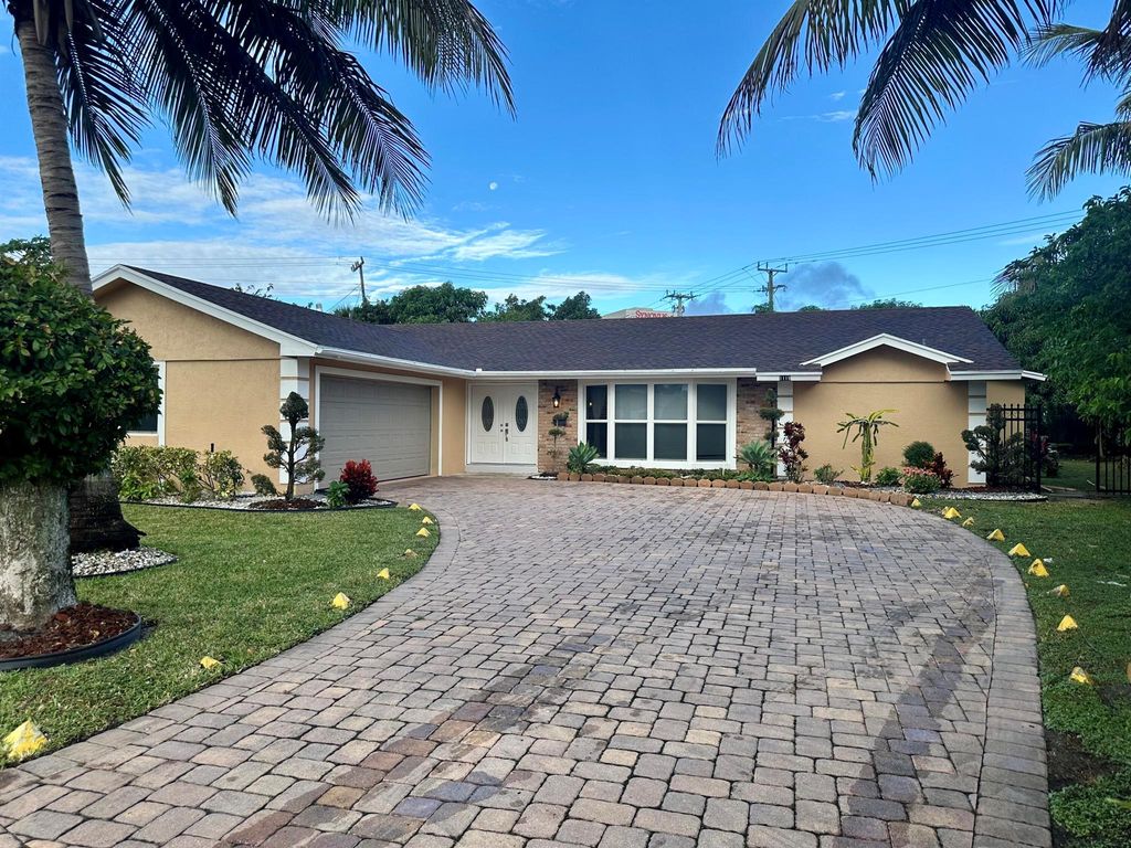 Photo of 1119 S Mangonia Circle, West Palm Beach, FL 33401 (MLS # R11047394)